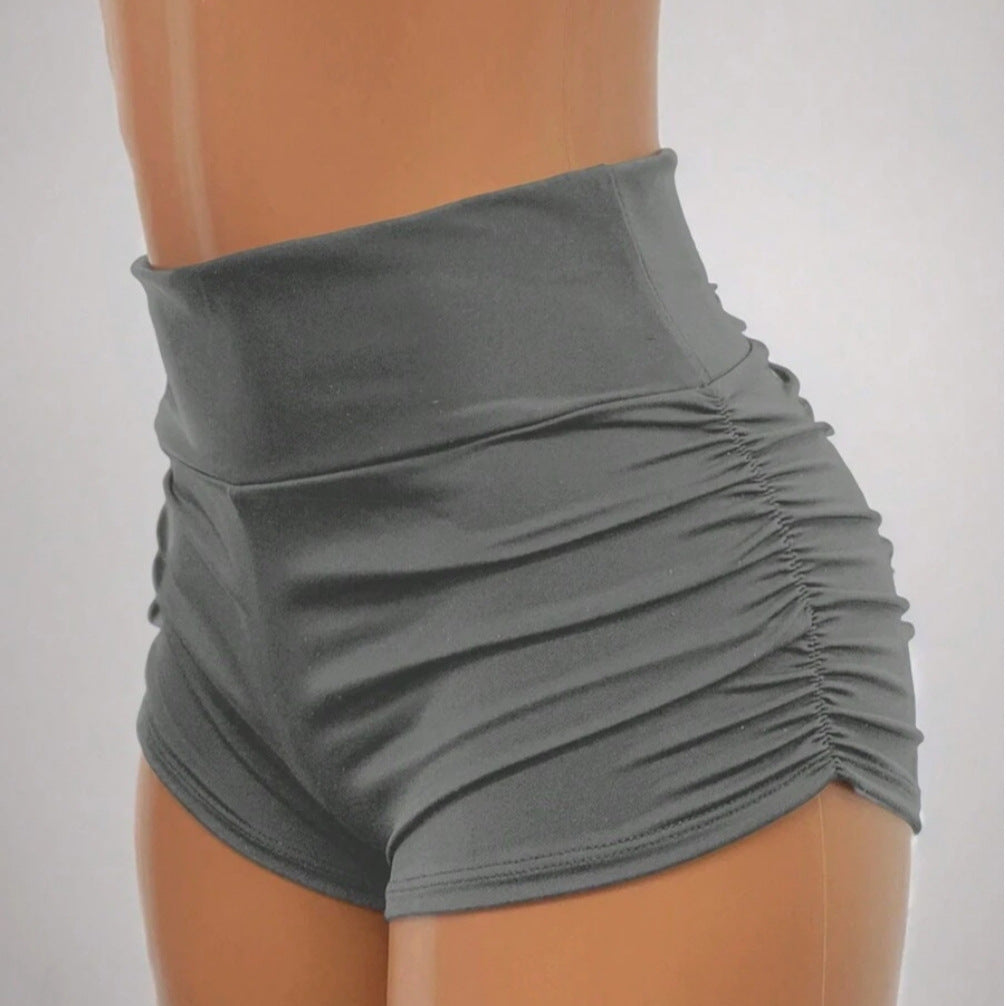 Black Halloween skull print cropped leggings with pleated design from Flip Styles, perfect for active wear and spooky style.