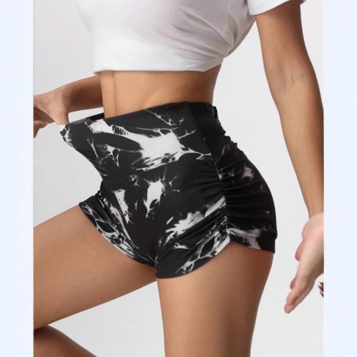 Halloween Skull Print Cropped Pleated Leggings by Flip Styles, featuring a spooky skull design and pleated style for active wear.